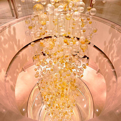 Long staircase glass bubble chandelier