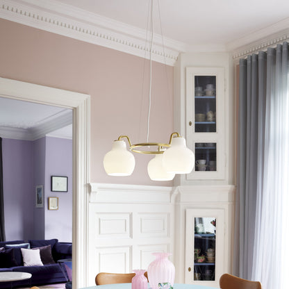 Elaetor Ring Crown Chandelier Shade: Mouth-blown & 3-layered & Opal Glass. Pendant Suspension: Untreated Brass & Will Patinate 21.7"W x 21.7"D