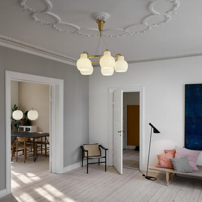 Elaetor Ring Crown Chandelier Shade: Mouth-blown & 3-layered & Opal Glass. Pendant Suspension: Untreated Brass & Will Patinate 21.7"W x 21.7"D